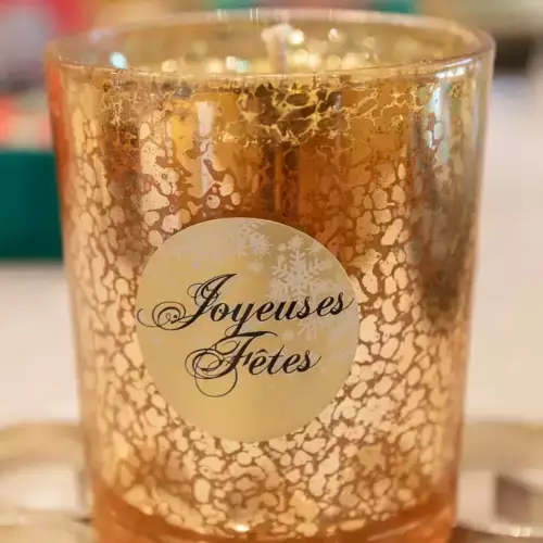 Bougie de Noël dorée avec paillettes dorées