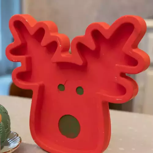 Cerf en feutre de protection au dos