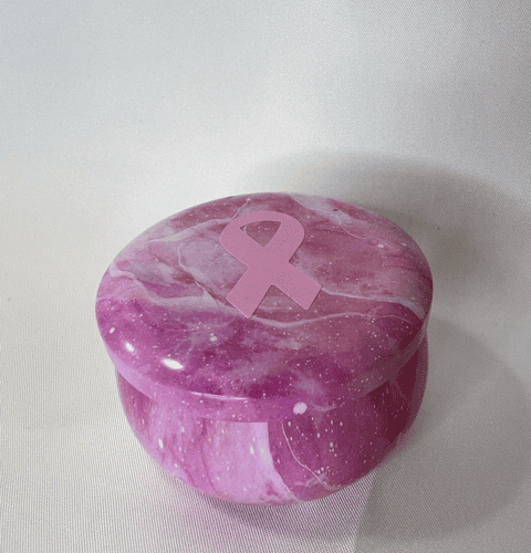 Bougie dans une boite en métal petit format marbré rose et blanc